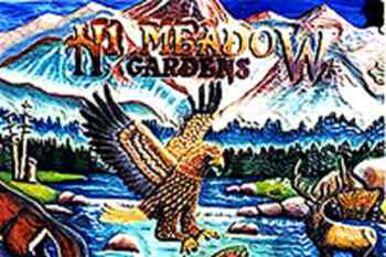 Hi Meadow Gardens sign with golden eagle and more.